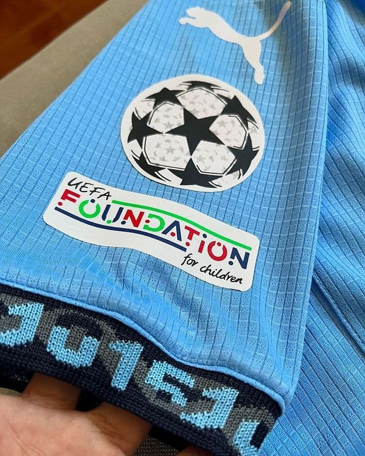 This is a Manchester City football jersey. - image 3